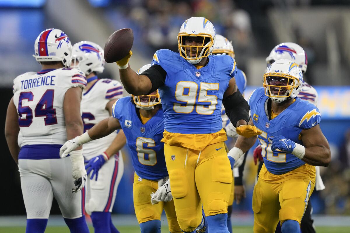Chargers defensive tackle Nick Williams (95) celebrates after recovering a fumble against the Buffalo Bills.