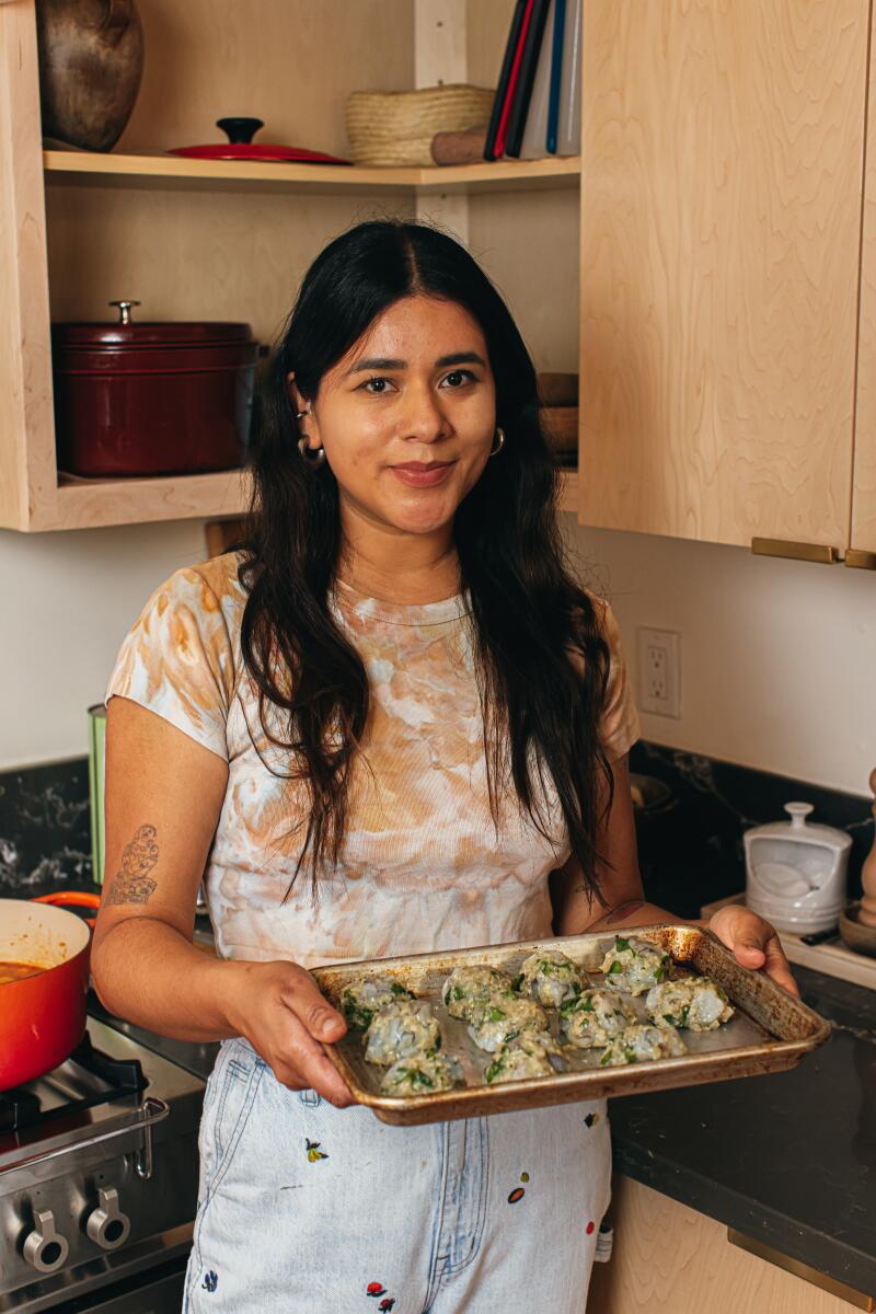 Paola Briseno González preparing Shrimp Meatball Broth.