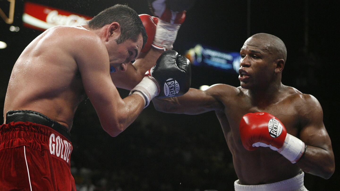 Oscar De La Hoya, Floyd Mayweather Jr.