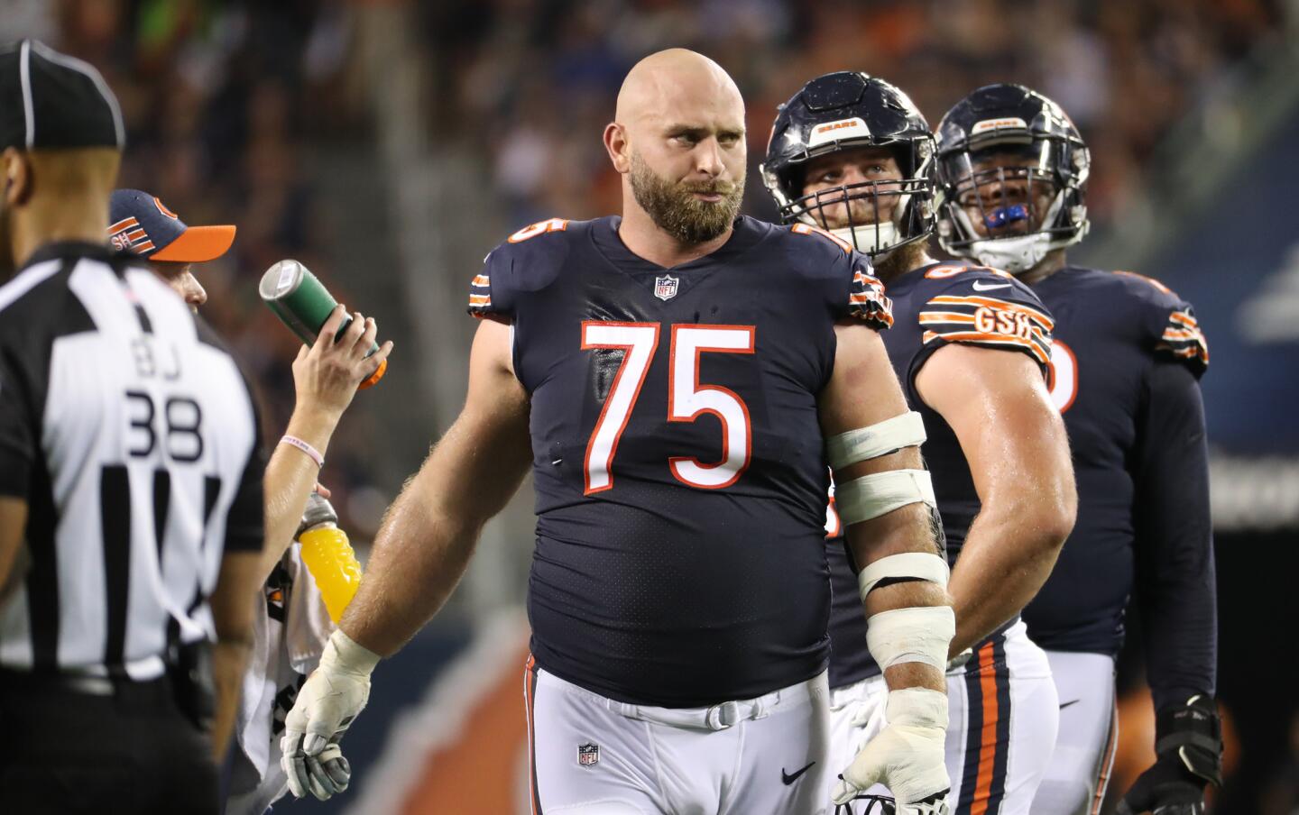 Bears offensive guard Kyle Long (75) takes a water break in the second quarter against the Seahawks at Soldier Field on Monday, Sept. 17, 2018.