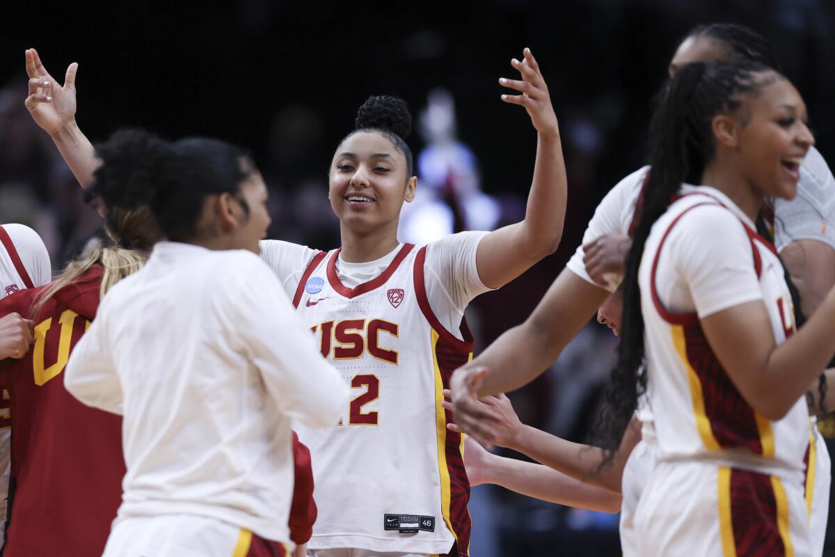 USC guard JuJu Watkins reacts after a Sweet 16 college basketball game against Baylor.