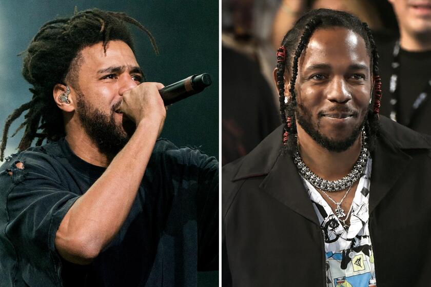 J. Cole wearing a black shirt and holding a microphone A picture of Kendrick Lamar wearing a chain and a white shirt smiling