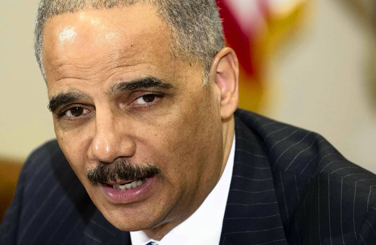 U.S. Atty. Gen. Eric H. Holder Jr., seen in July, said Thursday that an investigation into the CIA's treatment of detainees did not find admissable evidence "sufficient to obtain and sustain a conviction beyond a reasonable doubt."