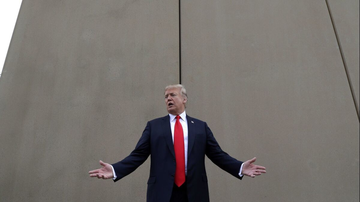 President Trump on a tour of border wall prototypes in San Diego last month.