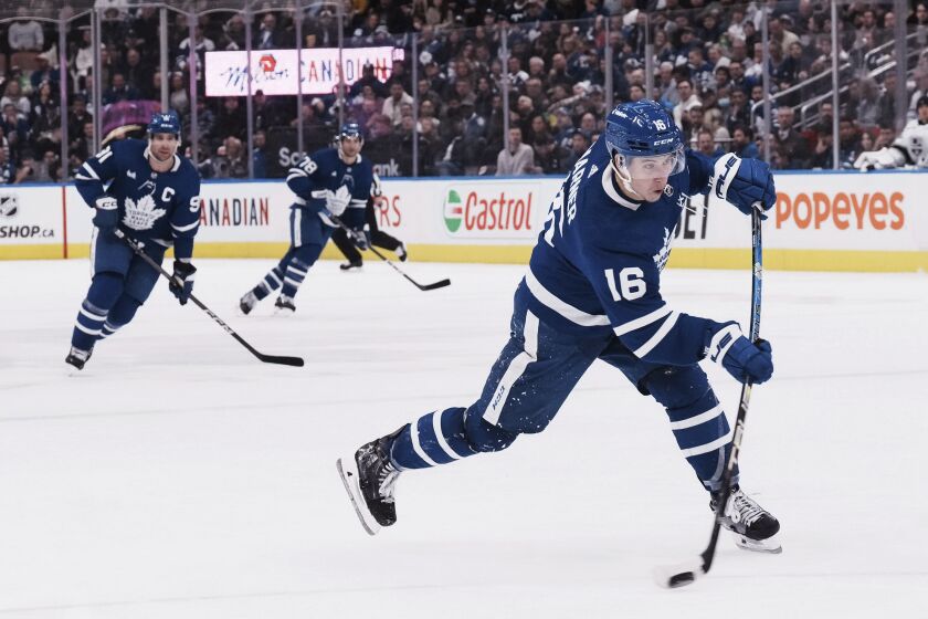 Toronto Maple Leafs' Mitchell Marner scores against the Los Angeles Kings during the second period of an NHL hockey game Thursday, Dec. 8, 2022, in Toronto. (Chris Young/The Canadian Press via AP)