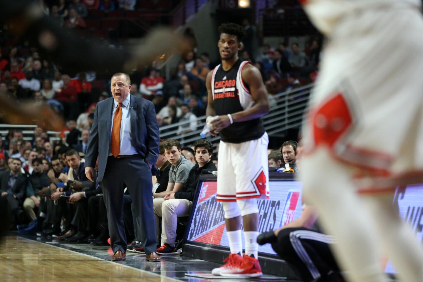 Chicago Bulls head coach Tom Thibodeau stands on the court in the