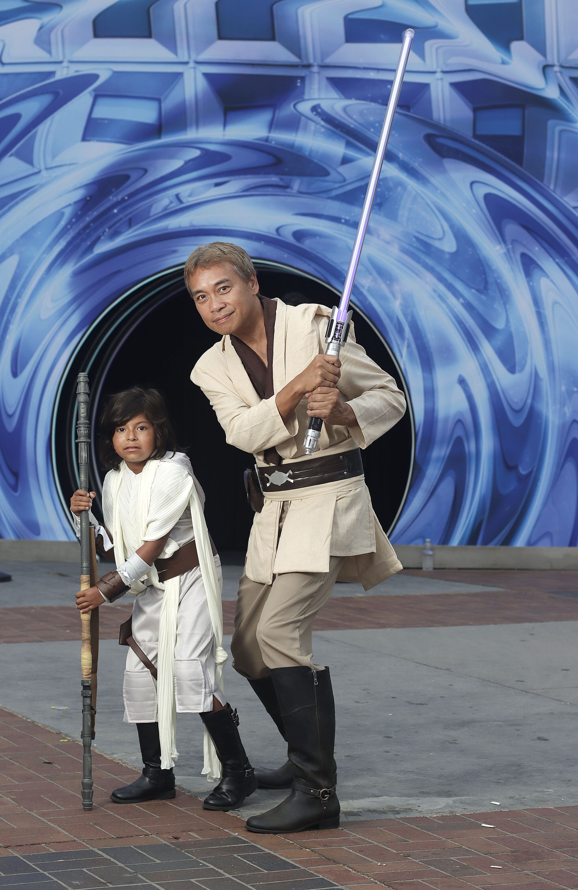 A man and his daughter dressed as Star Wars characters