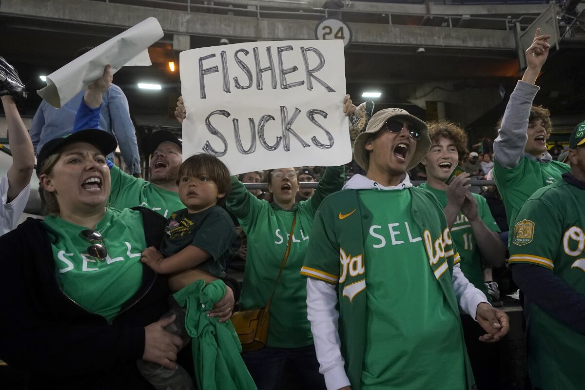 Oakland Athletics fans protest the team's ownership and a potential move to Las Vegas.