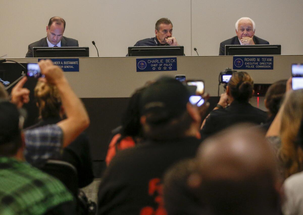 Alexander Bustamante, left, conducts investigations and reviews on behalf of the civilian board tasked with overseeing the 9,850-officer Los Angeles Police Department.