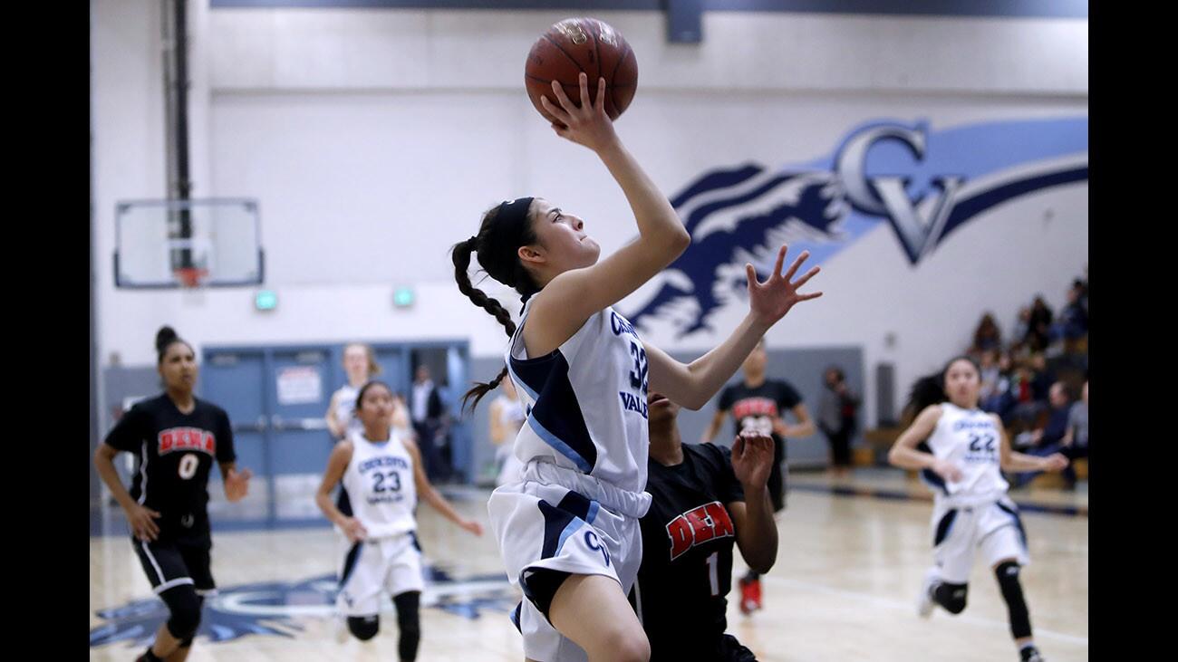 Crescenta Valley High School girls basketball player #32 Sarah Perez takes a short jumper in game vs. Pasadena High School at home in La Crescenta on Tuesday, Jan. 23, 2018.
