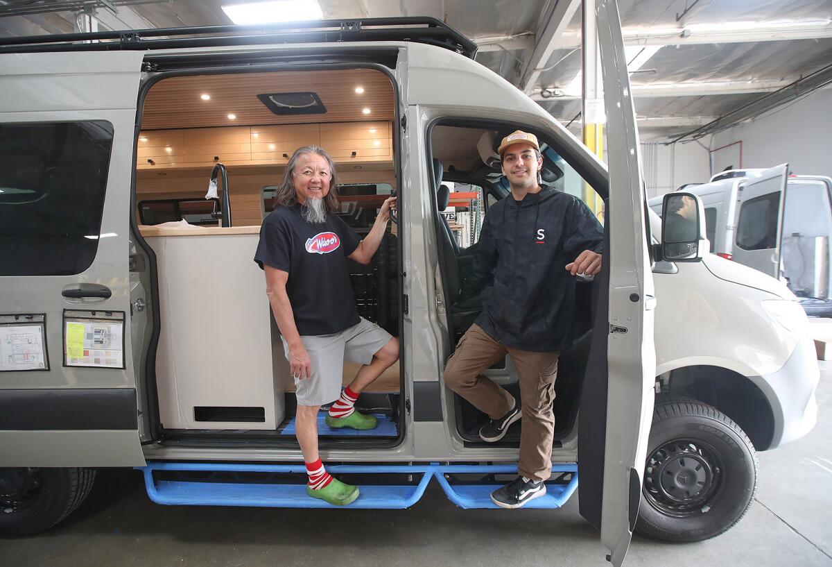Wing Lam, founder of Wahoo's Fish Taco and Duran Morley, owner and founder of Vanspeed van conversion shop, from left.
