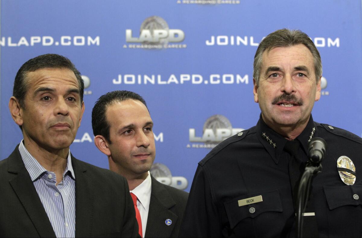 Los Angeles Mayor Antonio Villaraigosa, left, Los Angeles Councilman Mitchell Englander, middle, and Los Angeles Police Chief Charlie Beck announce that four suspects have been arrested in Las Vegas in the case related to the slayings of four people who were found dead in front of an unlicensed boarding house in Northridge during a news conference in Los Angeles.