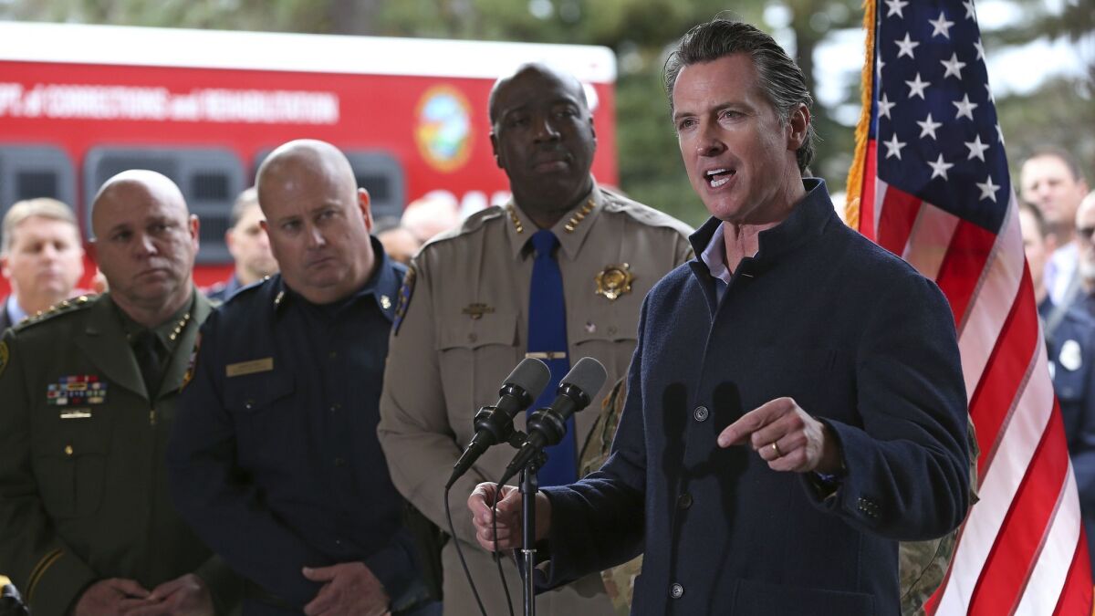 Gov. Gavin Newsom discusses emergency preparedness during a visit to the California Department Forestry and Fire Prevention CalFire Colfax station Tuesday, Jan. 8, 2019, in Colfax, Calif.