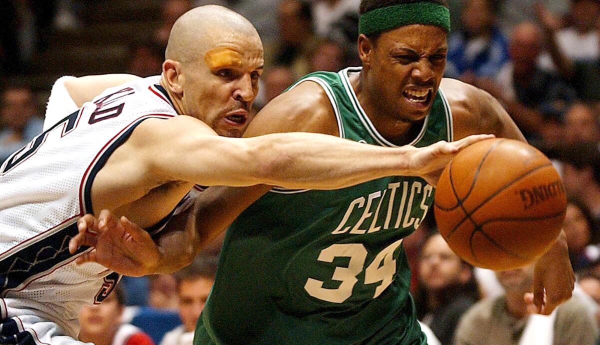 Jason Kidd steals the ball from Celtics forward Paul Pierce during Game 1 of the Eastern Conference finals in 2002.