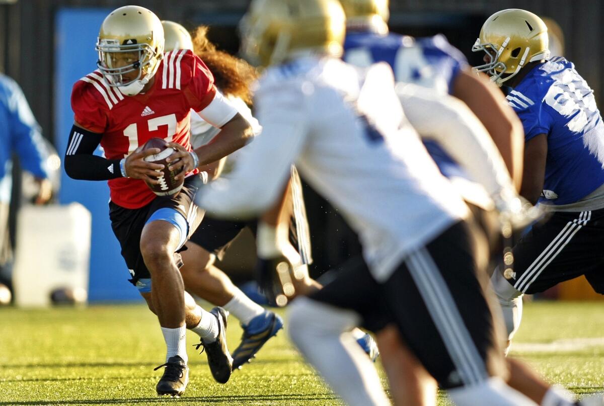 UCLA quarterback Brett Hundley and the Bruins' first team offense will face off against the first team defense at the school's spring game at StubHub Center on Saturday.