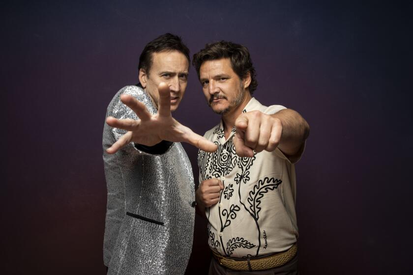 AUSTIN, TX - MARCH 12 Actors Nicolas Cage and Pedro Pascal from, "The Unbearable Wight Of Massive Talent," poses for a portrait at the LA Times Photo Studio at SXSW on Saturday, March 12, 2022 in Austin, TX. (Jay L. Clendenin / Los Angeles Times)
