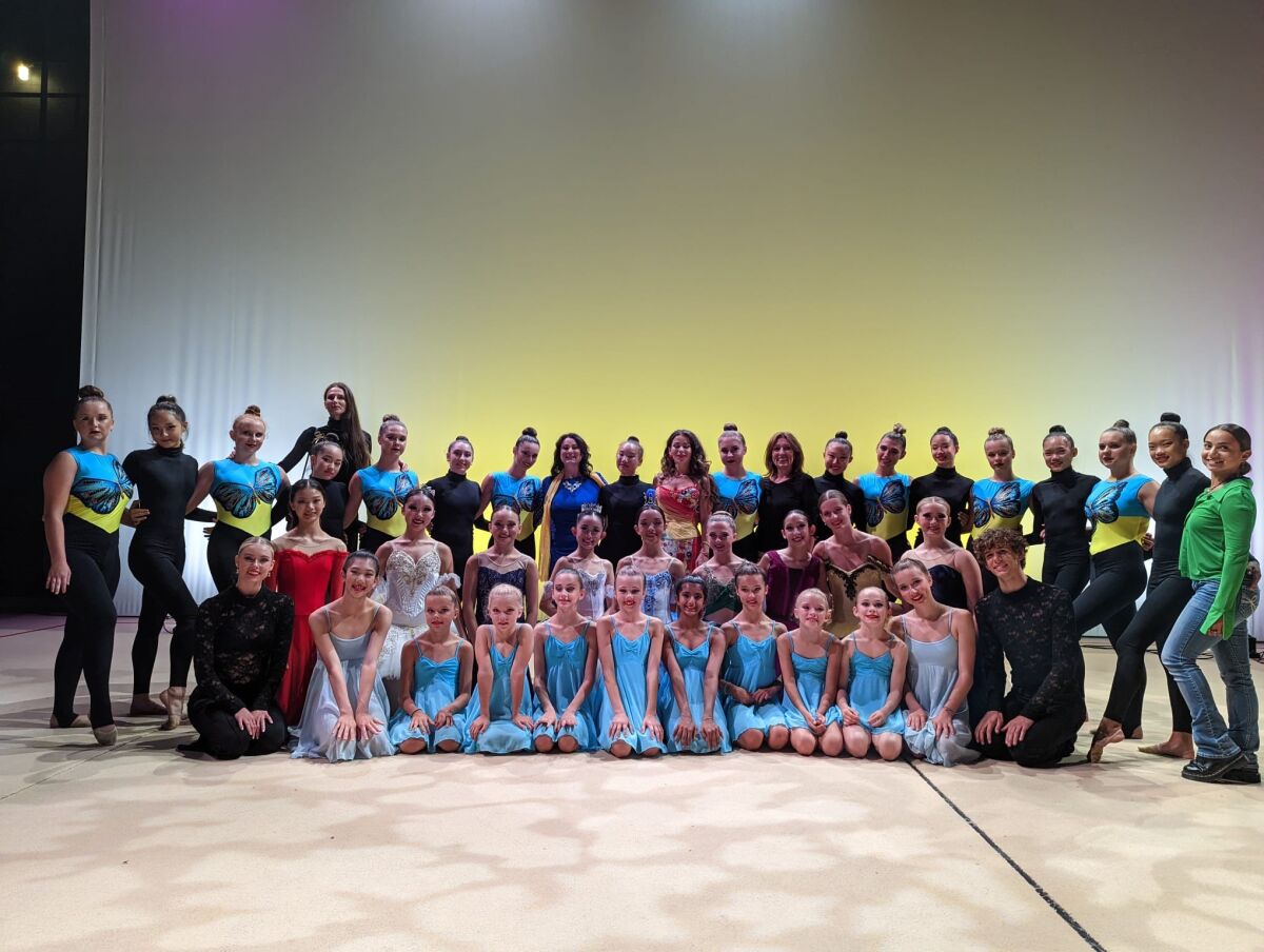 The Donnelly sisters join the other performers on stage at a fundraising gala that was held at Torrey Pines High School.