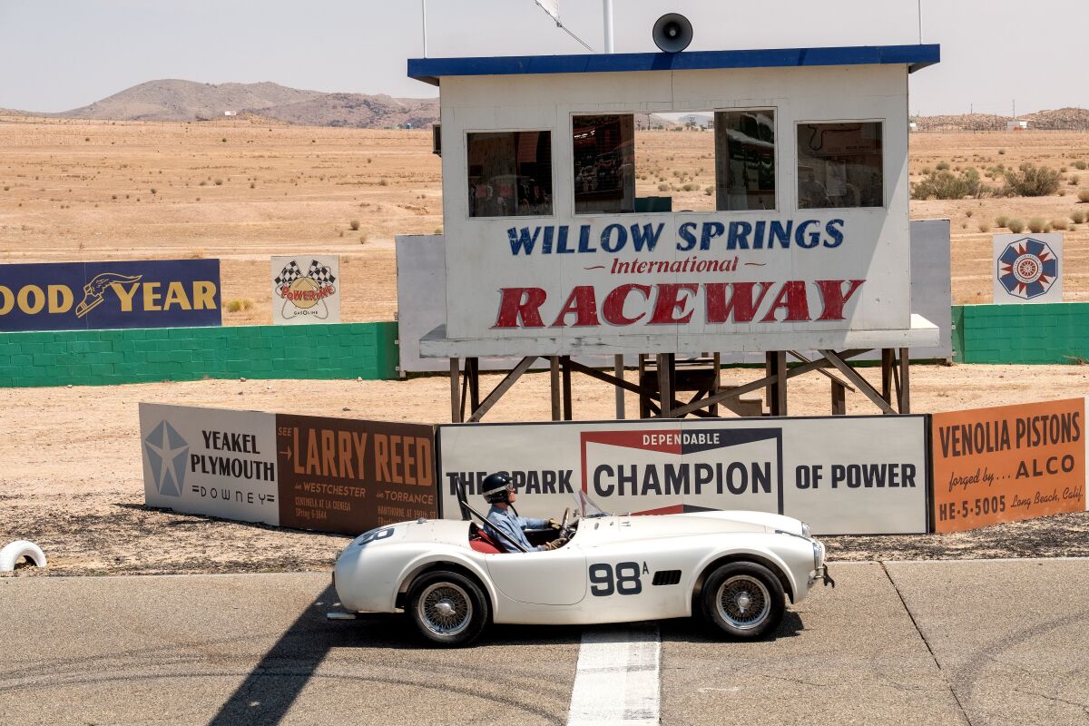 Christian Bale, as Ken Miles, in his Shelby race car at Willow Springs.