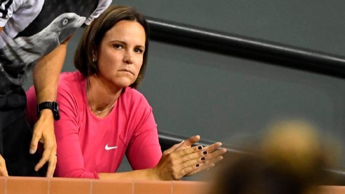 Tennis coach and former player Lindsay Davenport claps for Madison Keys after Keys defeated Naomi Osaka at the BNP Paribas Open tennis tournament on Mar. 13.