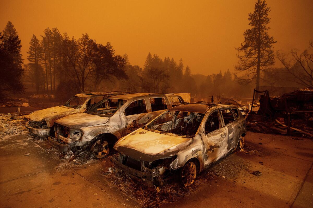Scorched vehicles at a used-car dealership in Paradise, Calif., on Friday.