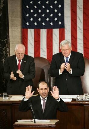Vice President Dick Cheney, left, and then-House Speaker J. Dennis Hastert applaud during Iraqi Prime Minister Nouri Maliki's speech to a joint meeting of Congress in 2006.