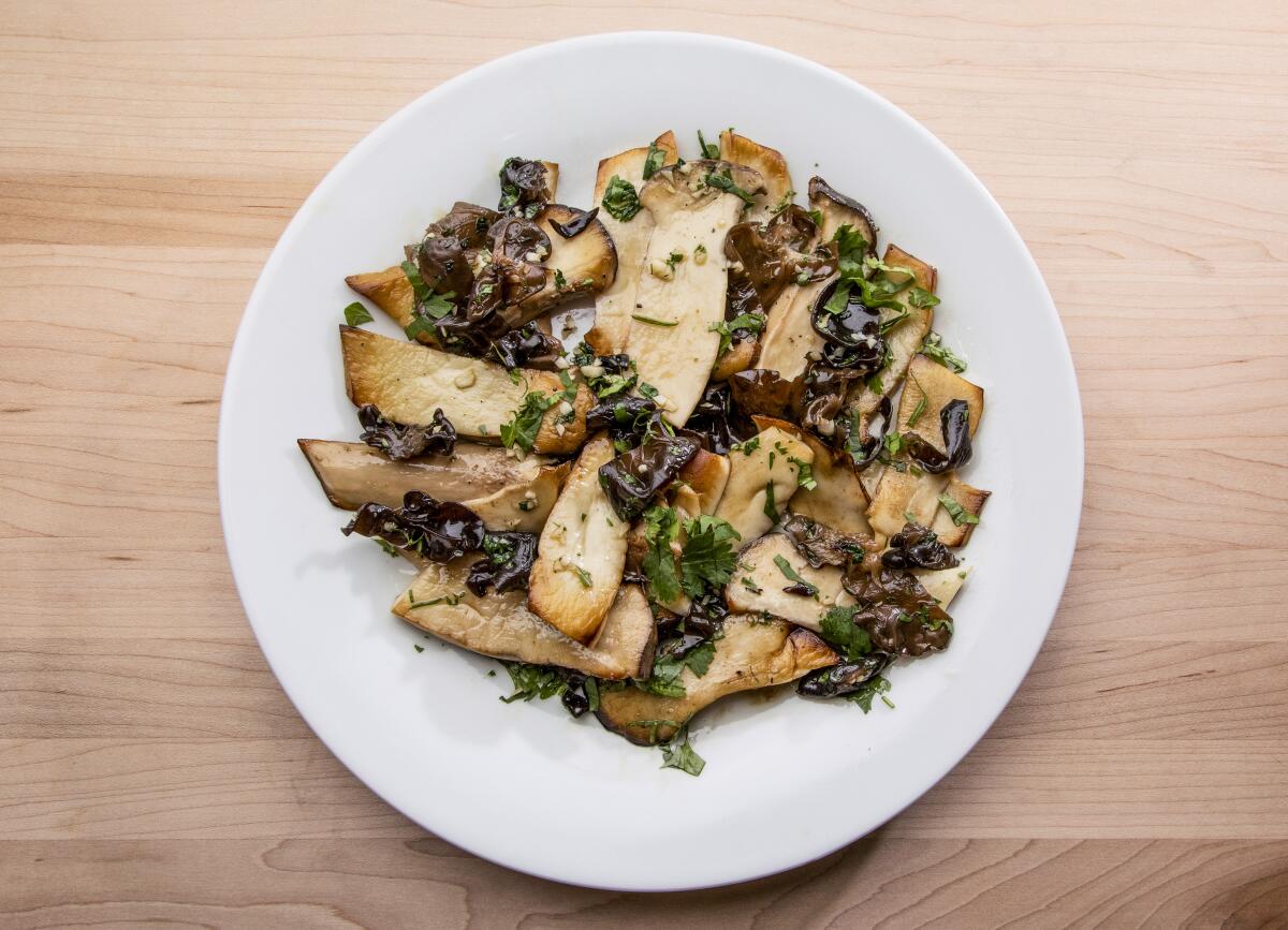 A lot of cooked mushrooms on a plate 
