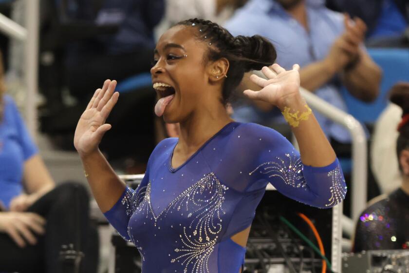 LOS ANGELES, CALIFORNIA - APRIL 01: Selena Harris of the UCLA Bruins reacts after competing.