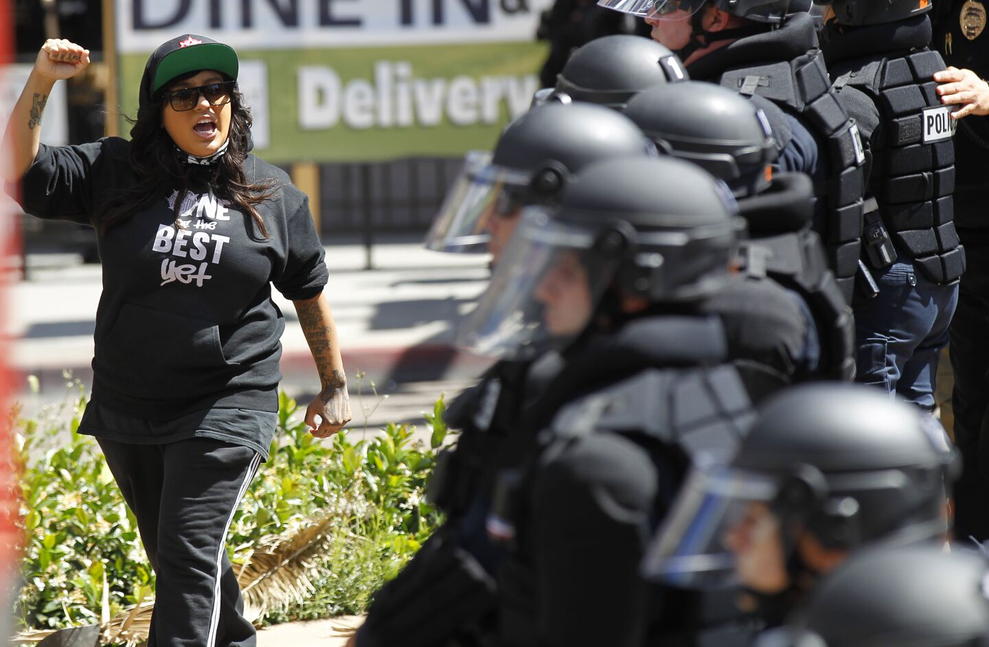 A protester yells at San Diego police in downtown San Diego on May 31, 2020. The group was protesting the death of George Floyd.