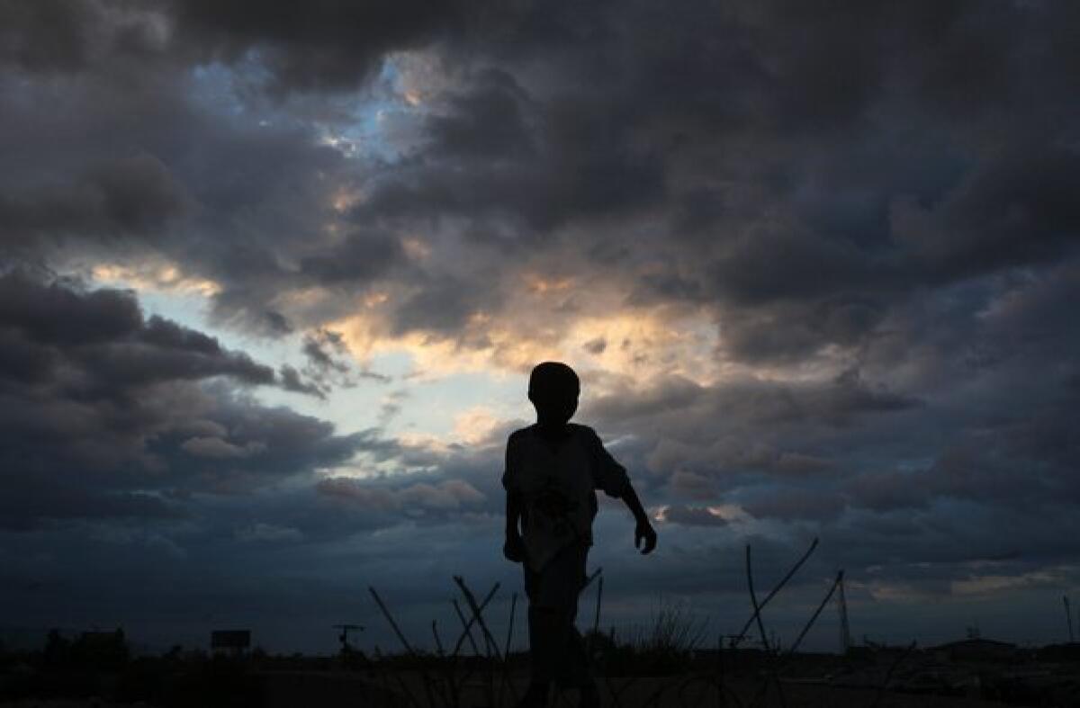 A child is shown in a Haitian refugee camp for victims of the 2010 earthquake that killed thousands.