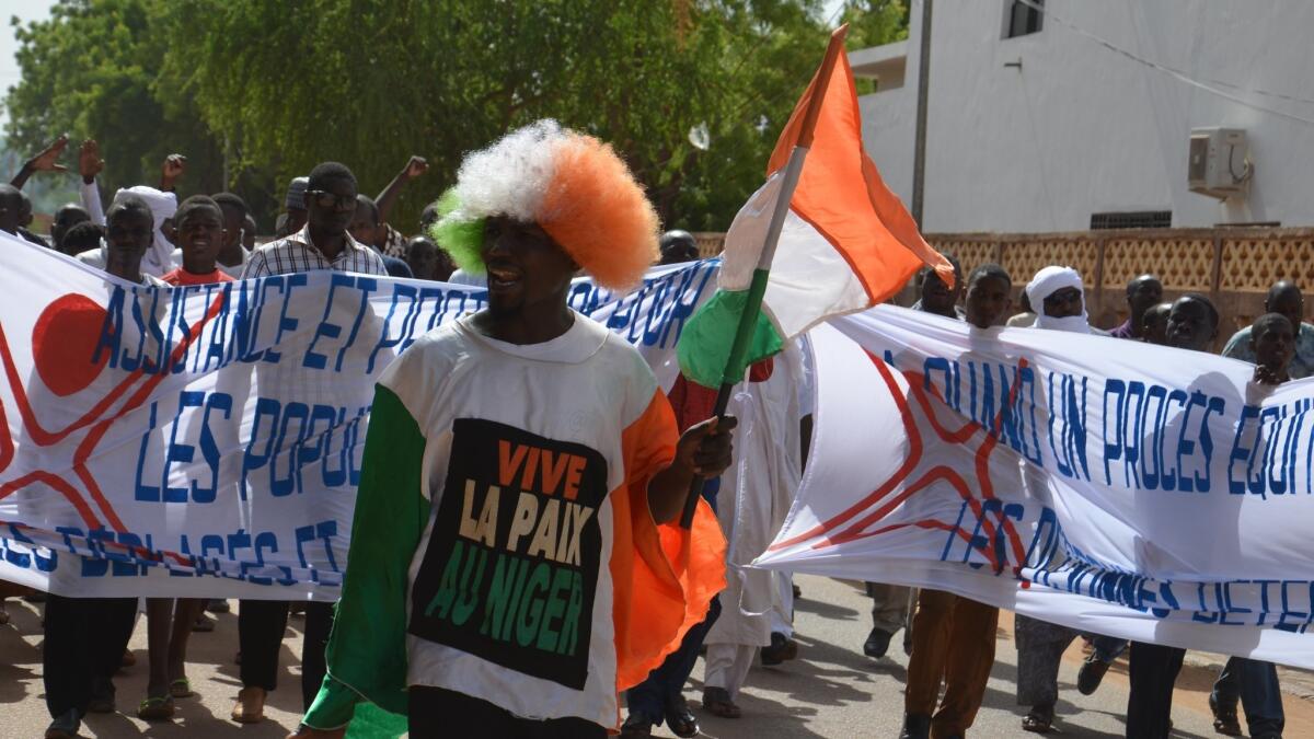 Demonstrators march in Niamey, Niger, against Boko Haram-related violence in the nation's southeast.