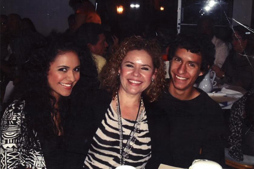 Ivan Ortiz, who died in a San Diego County jail, is pictured with his mother and  sister. 