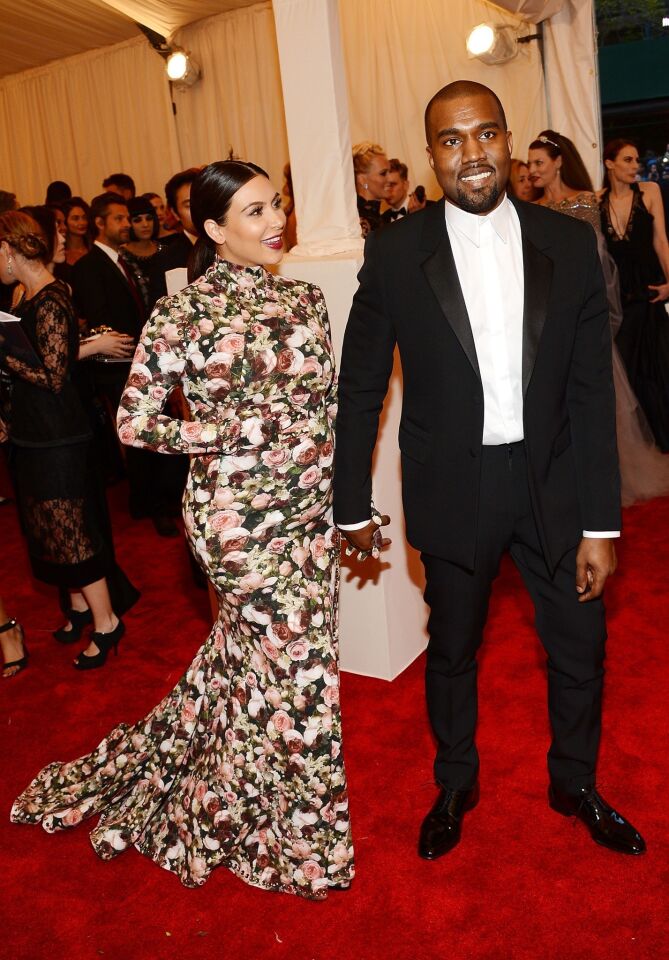 Kim Kardashian and Kanye West attend the Costume Institute Gala for the "PUNK: Chaos to Couture" exhibition at the Metropolitan Museum of Art on May 6, 2013, in New York City.