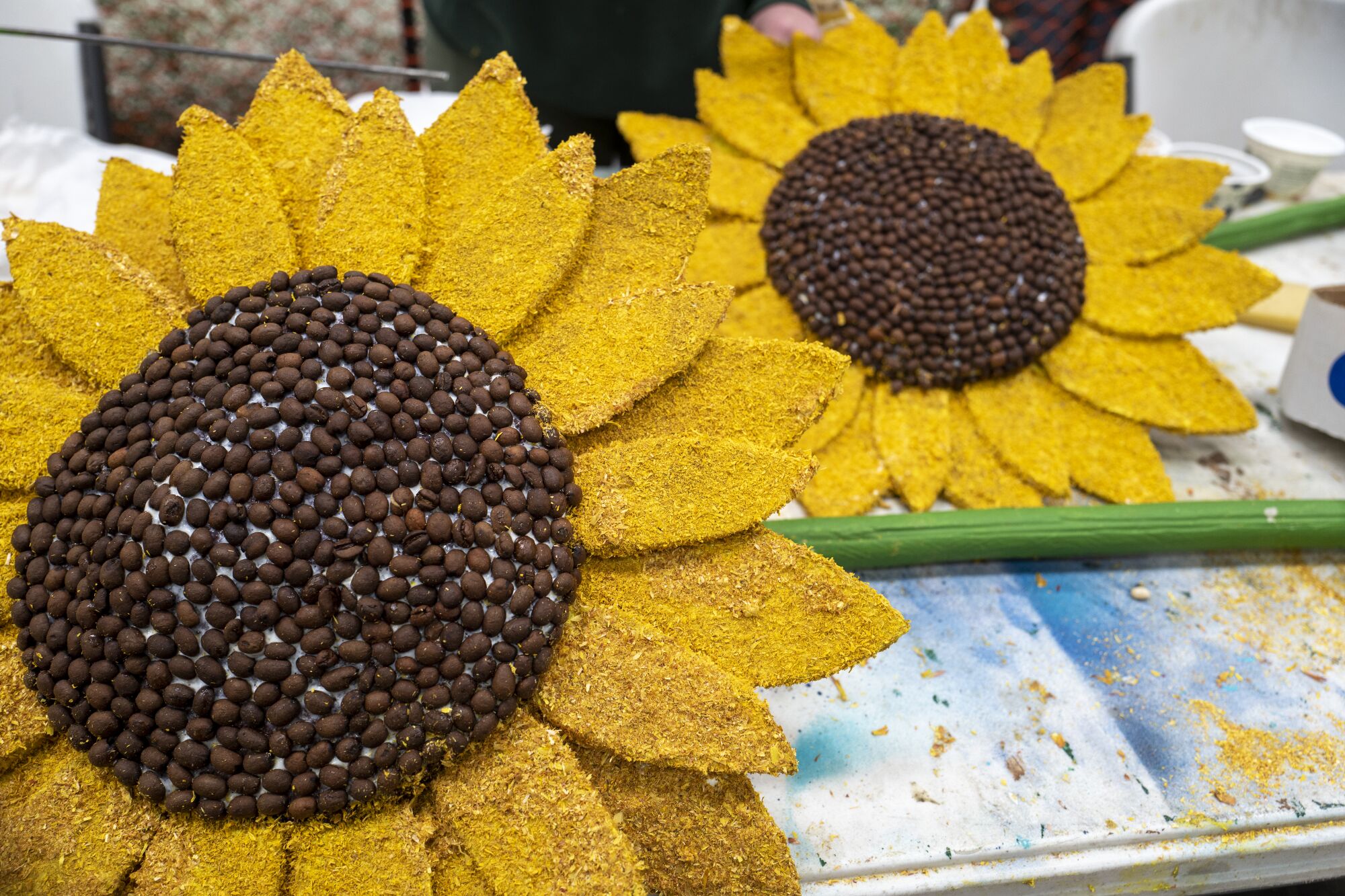 Detail of sunflowers being prepared for the Rose Parade