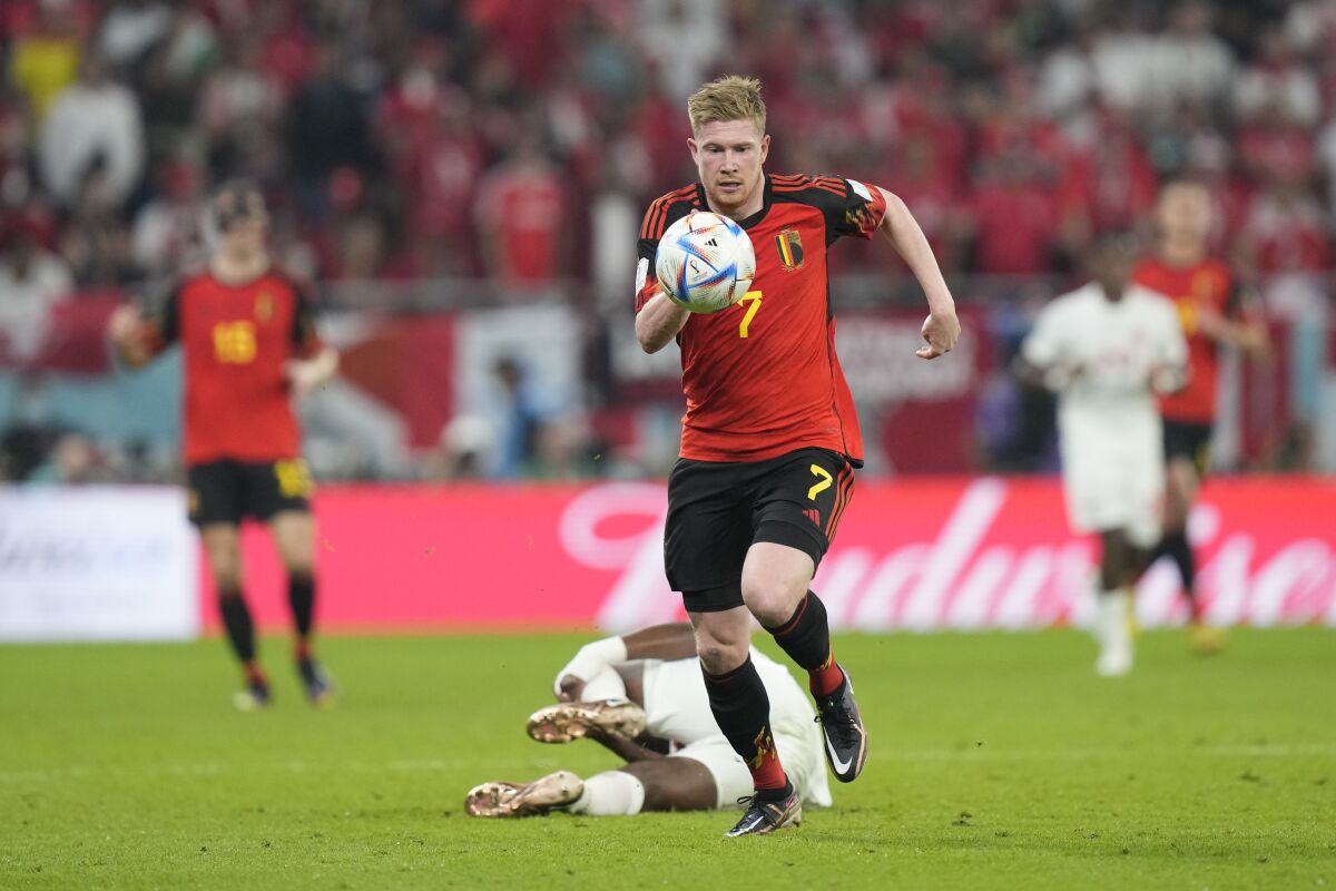 Belgium's Kevin De Bruyne in action during the World Cup group F soccer match between Belgium and Canada, at the Ahmad Bin Ali Stadium in Doha, Qatar, Wednesday, Nov. 23, 2022. (AP Photo/Darko Bandic)