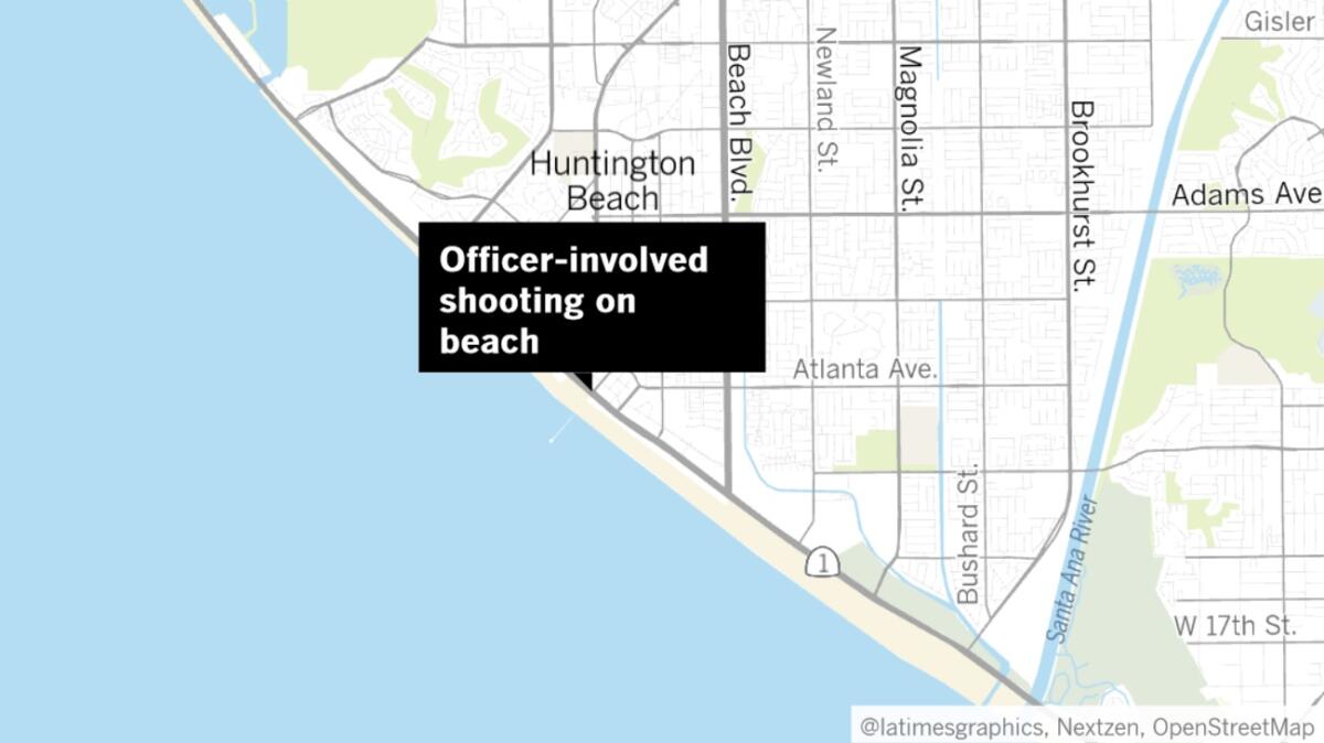 A police officer fired a weapon after a fleeing suspect ran onto Huntington City Beach early Wednesday. The suspect was not hit, police said.