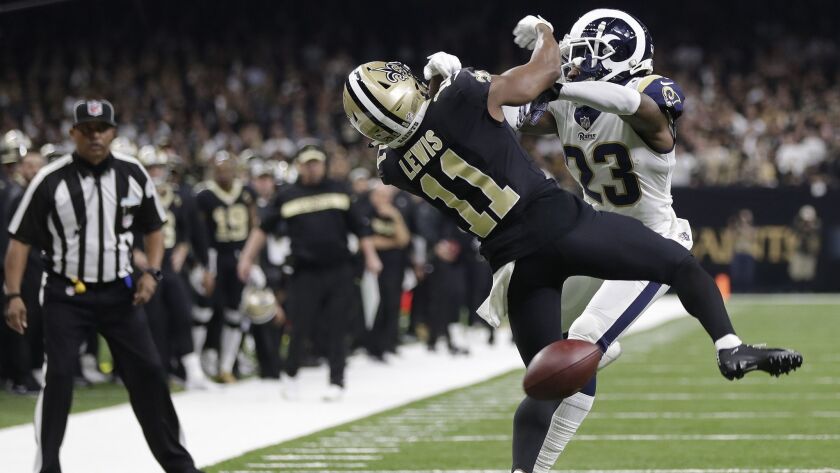 New Orleans Saints wide receiver Tommylee Lewis and Rams defensive back Nickell Robey-Coleman collide during the NFC championship game Sunday.