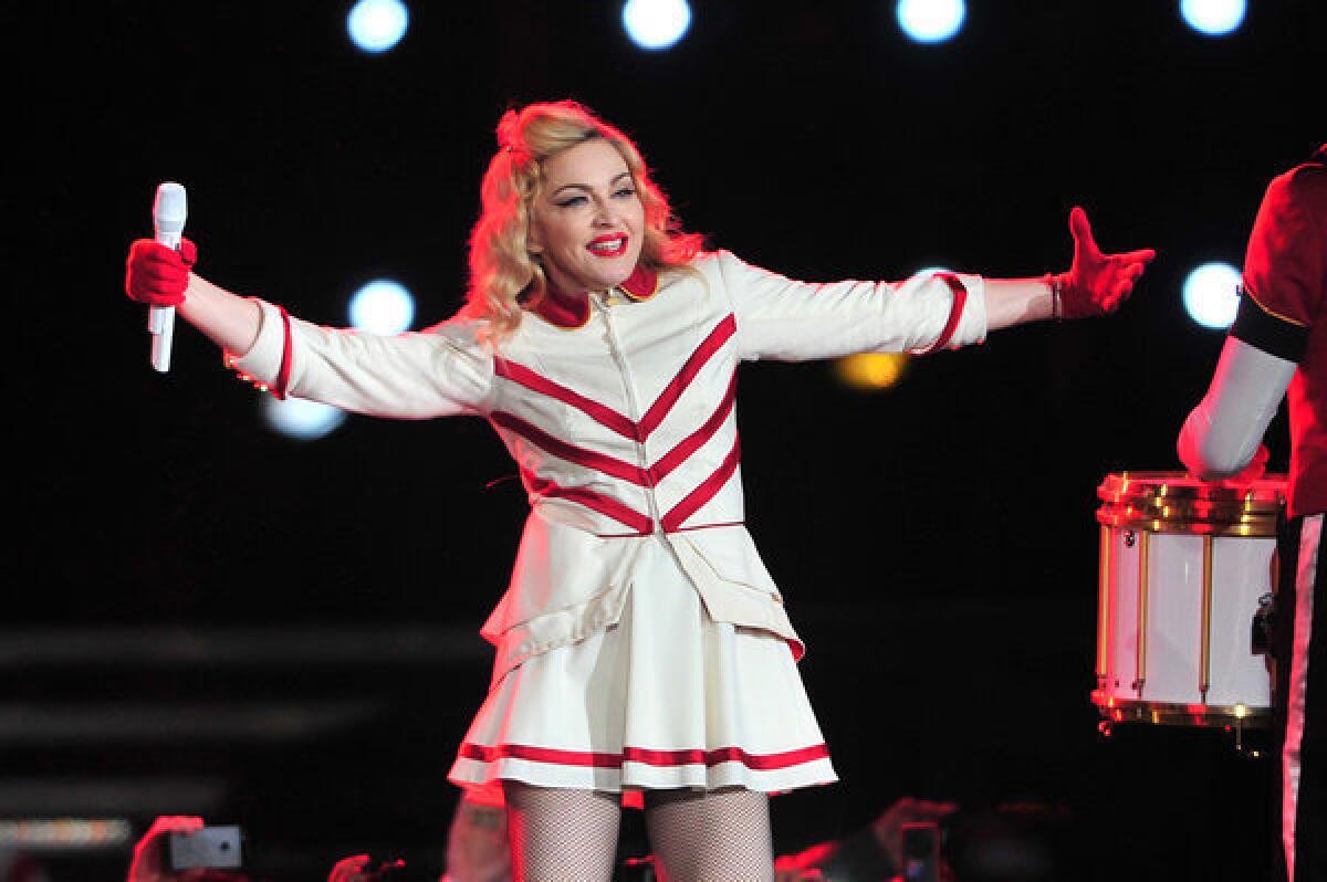 Madonna, shown on a recent tour stop in Chile, grossed just under $300 million with her MDNA tour in 2012.