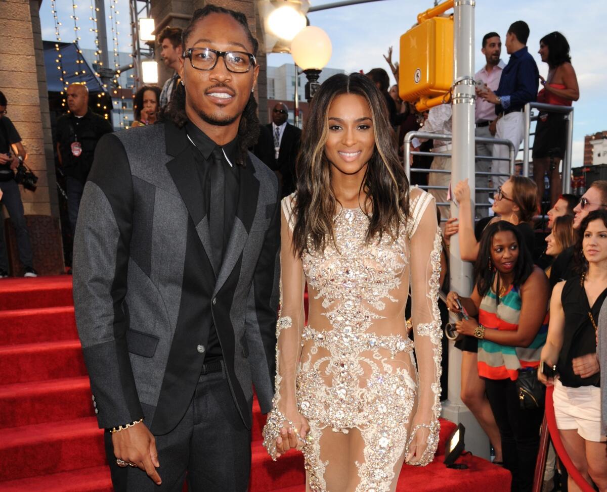 Singer Ciara, right, and music producer Future, shown in August, are engaged to be married.