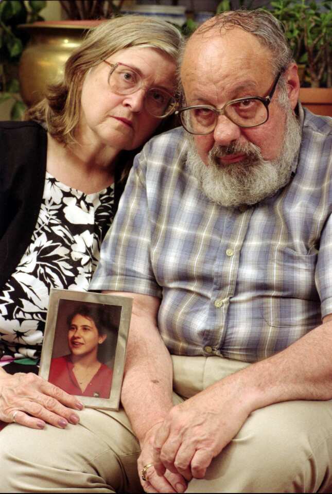 Hope and Arnold Arsesky in 1996 hold a photograph of their daughter Rachael, who died in the 1988 Lockerbie plane crash.