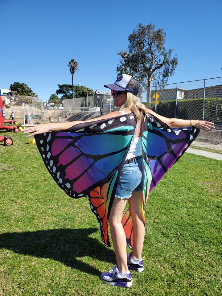 Bird Rock Elementary School parent Kimberly Spear flaps her butterfly wings during the Bird Rock Foundation's Fall Festival on Oct. 27 at the school.