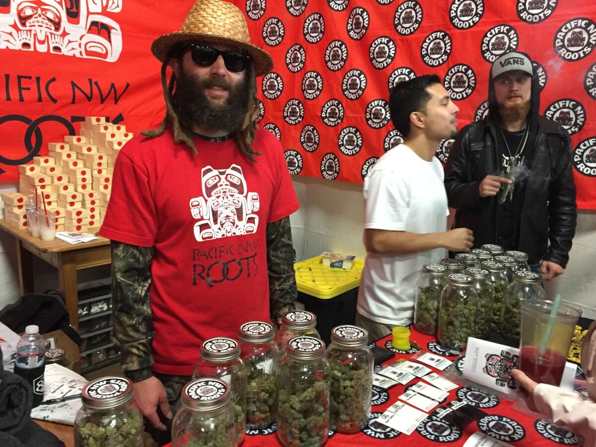 Selling prized cannabis seeds at the Emerald Cup, Ras Kaya Paul of the Washington state cultivator Pacific NW Roots
