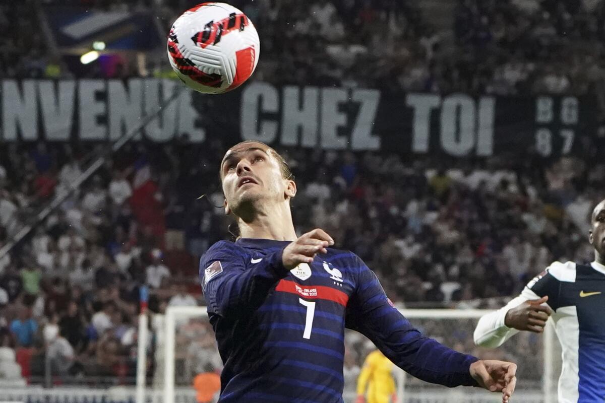 France's Antoine Griezmann controls the ball during the World Cup 2022 group D qualifying soccer match between France and Finland at Decines stadium in Lyon, France, Tuesday Sept. 7, 2021. (AP Photo/Laurent Cirpiani)