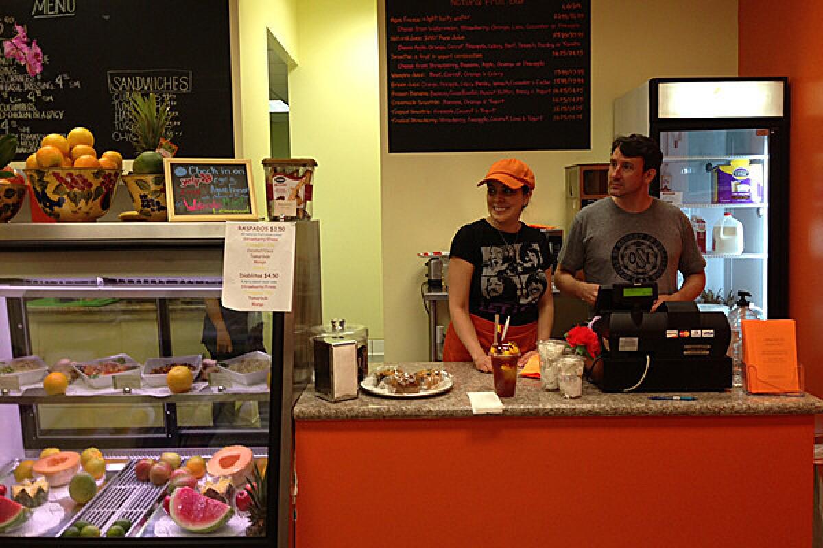 David O'Kelley and Fernanda Kelley work the counter at Angelus Salads Plus in Echo Park.