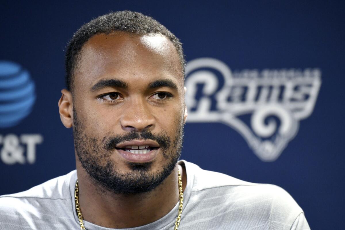 Rams wide receiver Robert Woods speaks during a news conference.