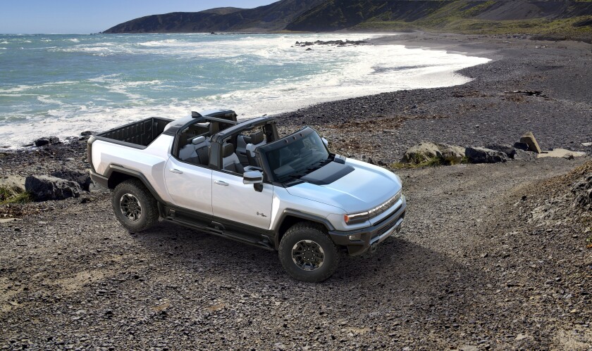 This undated photo provided by General Motors shows the 2022 GMC Hummer EV, an electric SUV that promises 1,000 horsepower via three electric motors. (General Motors via AP)