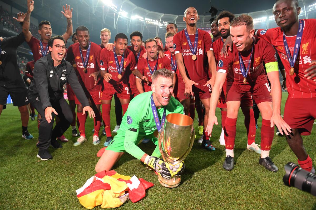 ISTANBUL, TURKEY - AUGUST 14: Adrian of Liverpool celebrates with the UEFA Super Cup trophy as Liverpool celebrates victory following the UEFA Super Cup match between Liverpool and Chelsea at Vodafone Park on August 14, 2019 in Istanbul, Turkey. (Photo by Michael Regan/Getty Images) ** OUTS - ELSENT, FPG, CM - OUTS * NM, PH, VA if sourced by CT, LA or MoD **