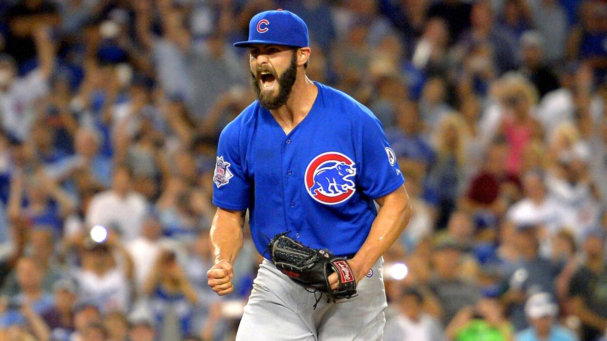 Cubs ace Jake Arrieta reacts after throwing a no-hitter against the Dodgers on Aug. 30, 2015.
