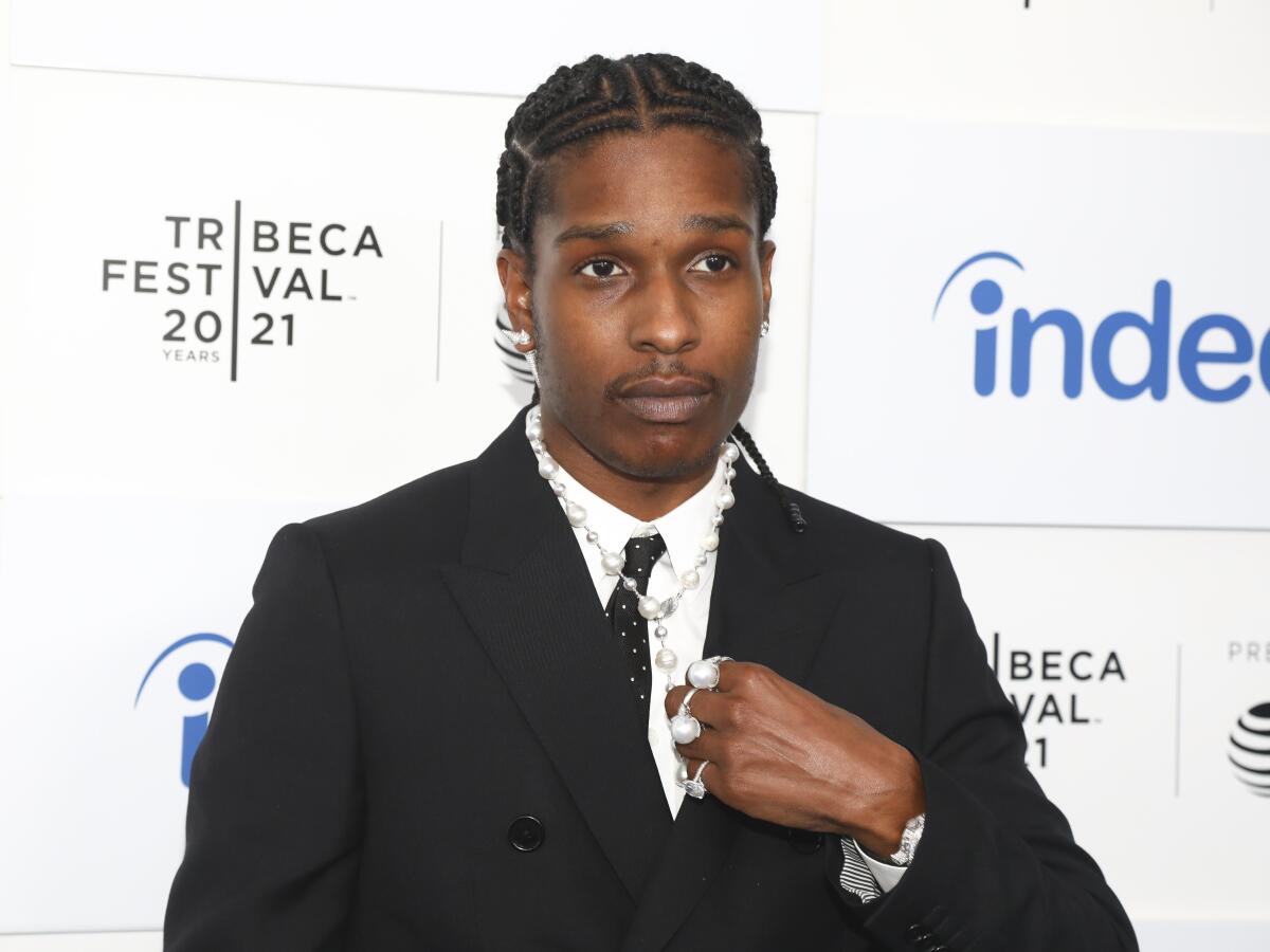 FILE - Recording artist A$AP Rocky attends the premiere for "Stockholm Syndrome," during the 20th Tribeca Festival at The Battery on Sunday, June 13, 2021, in New York. On Monday, Aug. 15, 2022, A$AP Rocky was charged with two felonies for pulling a gun on a former friend and firing in Hollywood in 2021, prosecutors said. (Photo by Andy Kropa/Invision/AP, File)