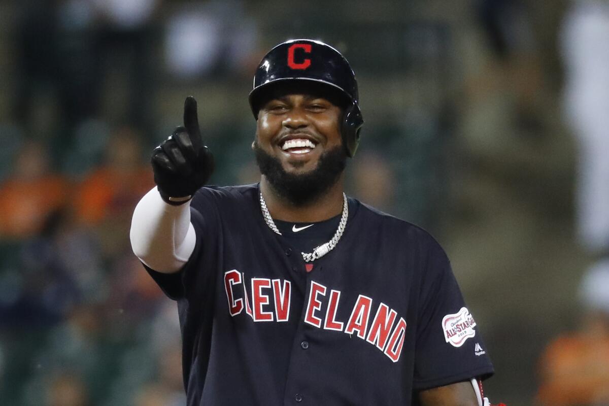 Cleveland Indians' Franmil Reyes gestures to the dugout after hitting a double in the sixth inning of a baseball game against the Detroit Tigers in Detroit last month.