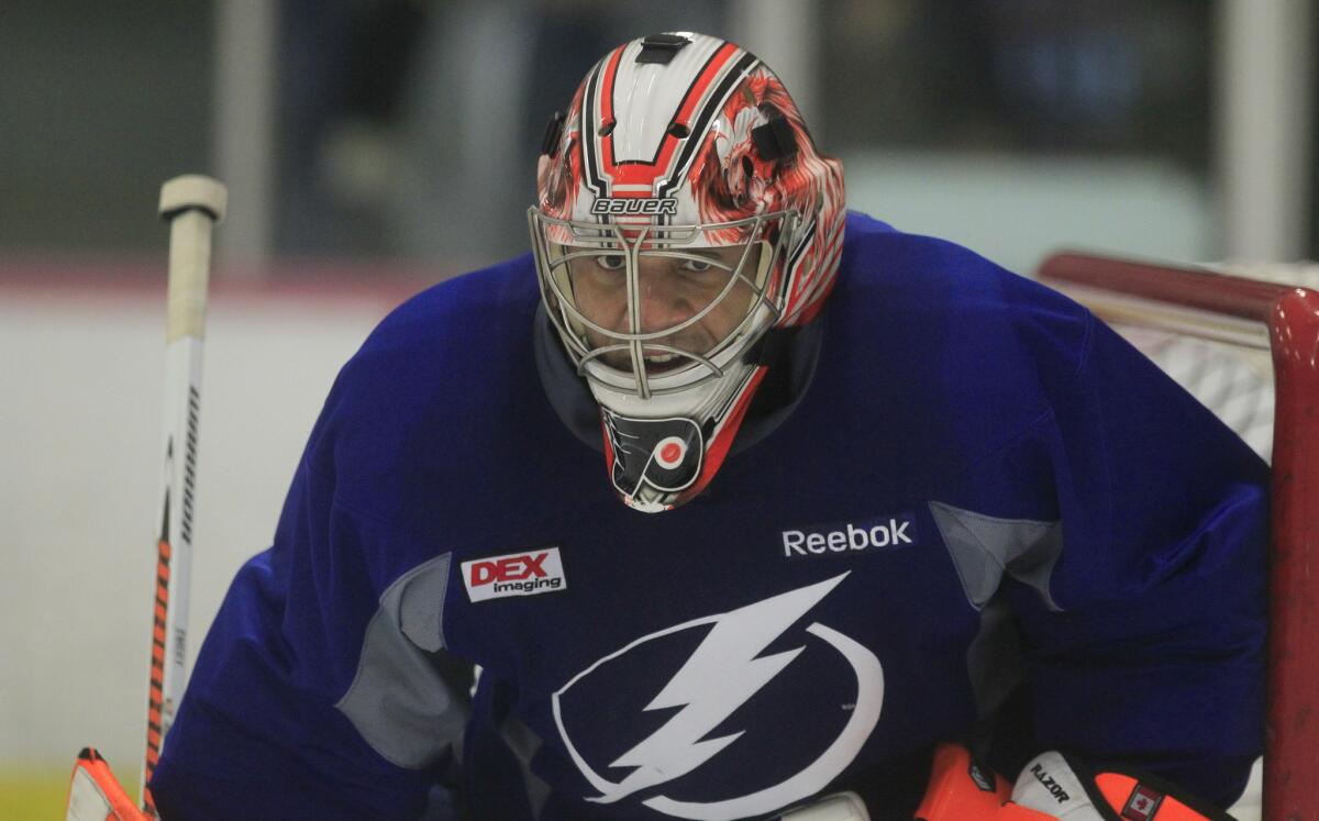 Goaltender Ray Emery works in the net during the Tampa Bay Lightning's training camp on Sept. 18.